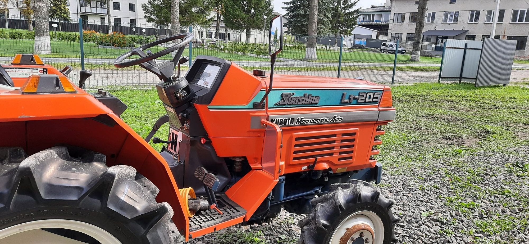 Японський мінітрактор. Трактор. Kubota