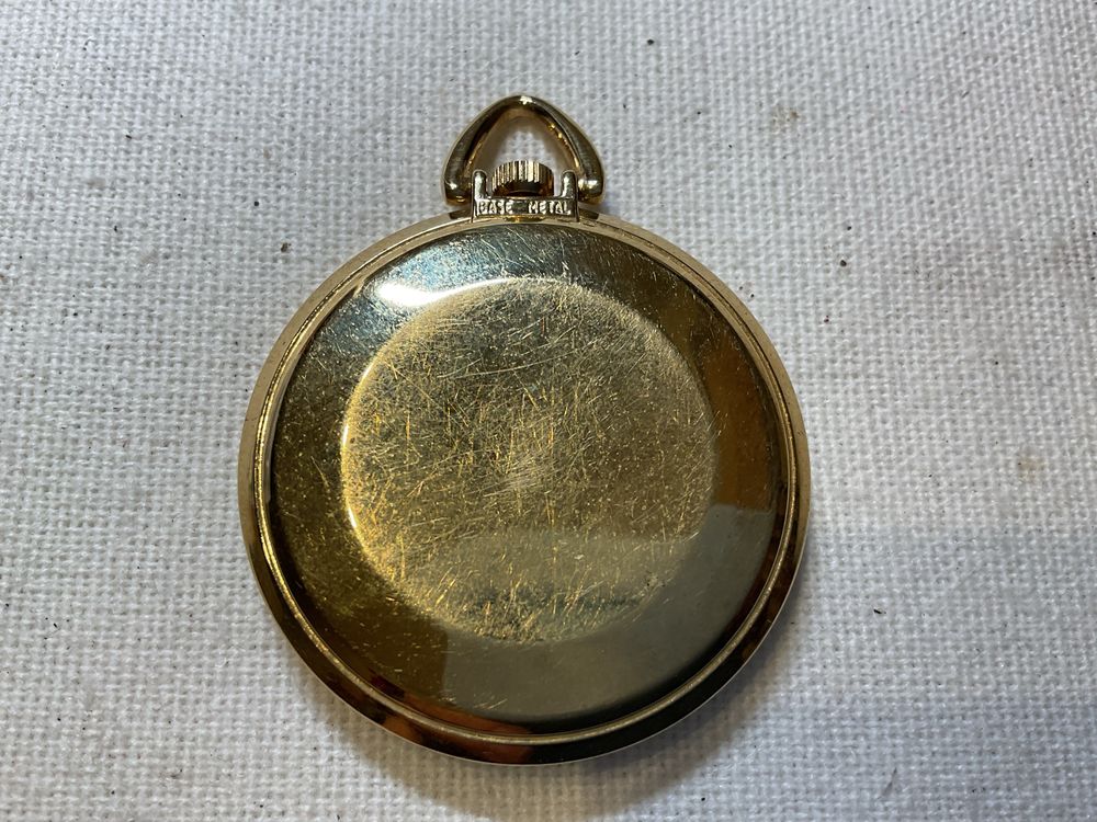 Relogio de bolso Timex dourado