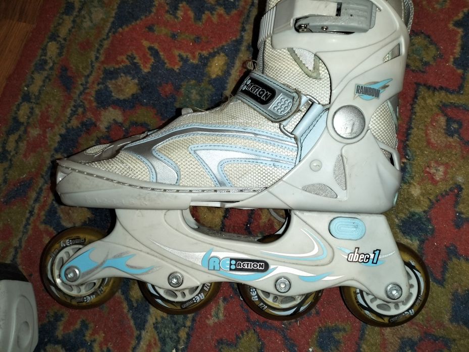 Ковзани ролікові Re: action