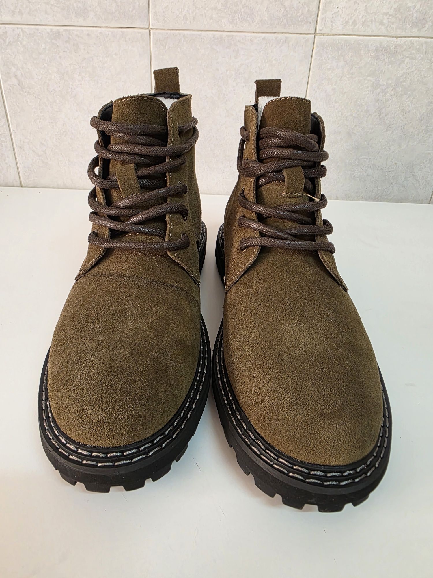 Botas de cano curto em couro