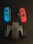 Nintendo Switch Oled 2x Joy Con (Blue + Red) + Grip