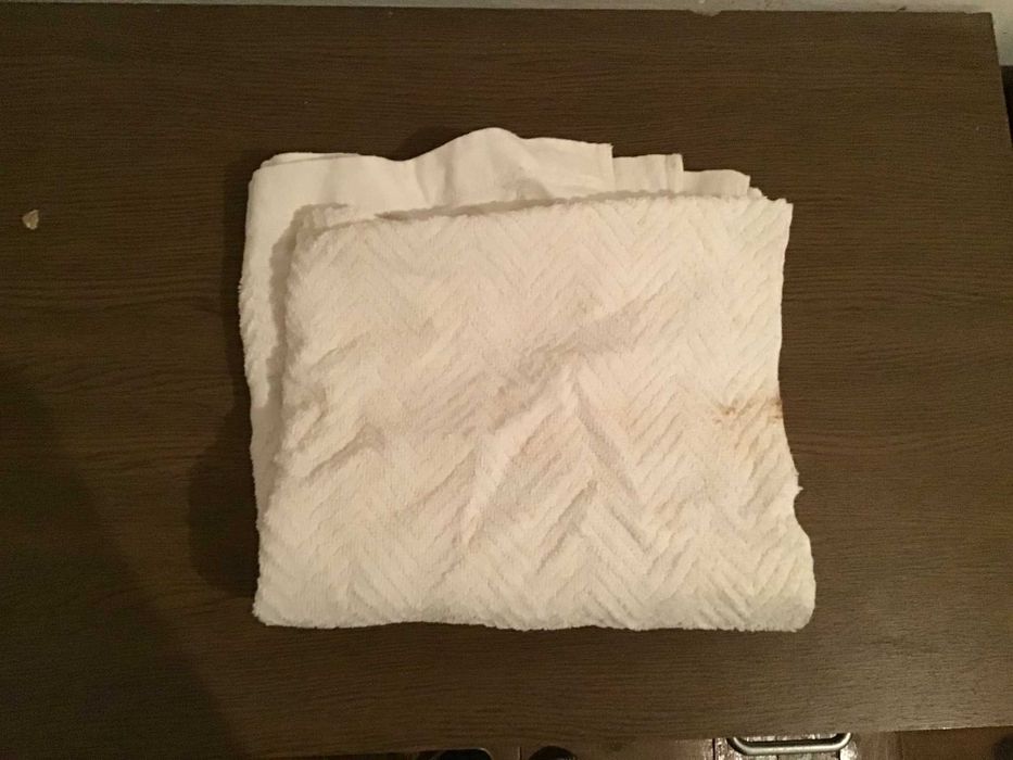 toalha branca de cara