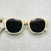 Стильні сонцезахисні окуляри молочного кольору із чорними лінзами