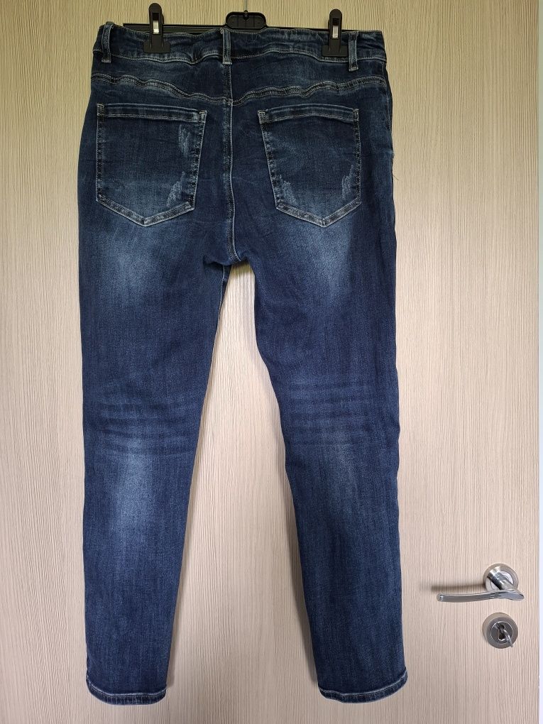 Jeansowe granatowe spodnie z podszytymi dziurami r.xl + gratis