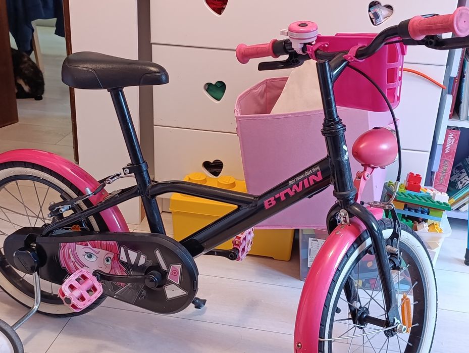 Rower btwin 16 cali dla dziewczynk z kołkami bocznymi