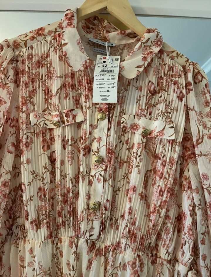 Reserved sliczna plisowana morelowa sukienka w kwiaty XL