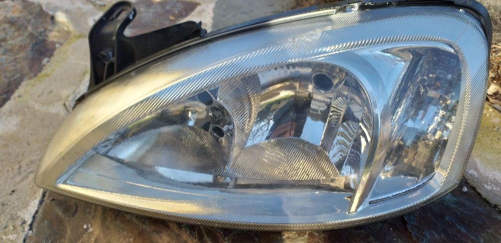 Farol esquerdo Opel  Corsa 1.3 CDTI