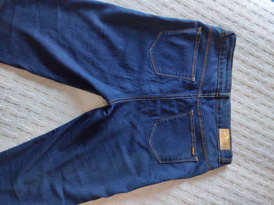 Calças de ganga justas elásticss