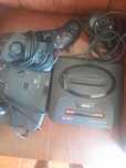 Consola megadrive com dois comandos descontados