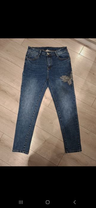 Ciemno granatowe dzinsy rozmair 33