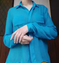 Блуза блакитного/синього кольору