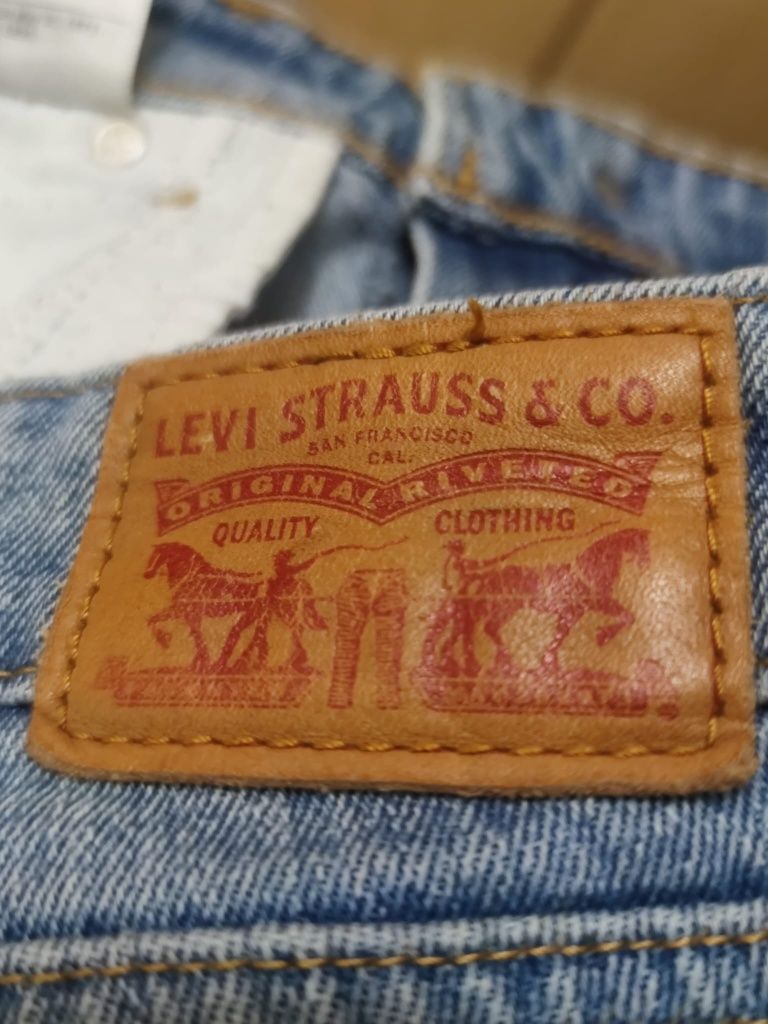 Spodnie jeansowe damskie Levi's 711 S XS w 30 l 32 Strauss jasne błęki