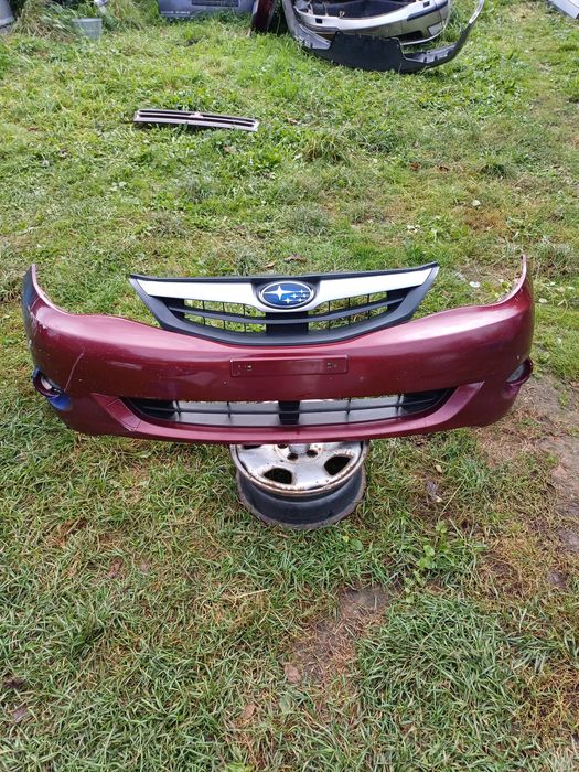 Subaru Impreza 08-13r передній бампер з ришіткою