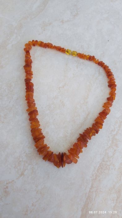 Янтарні буси з замком