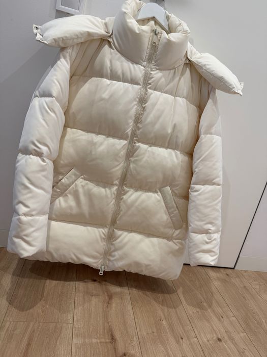 Пуховик в молочному кольорі