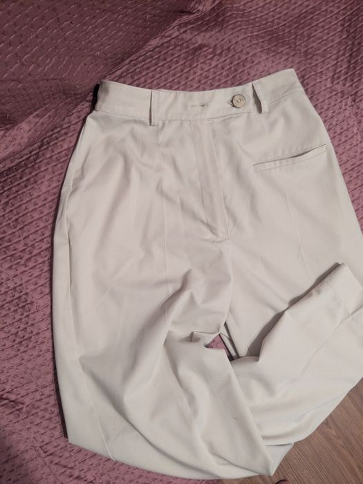 Брюки бежевого кольору