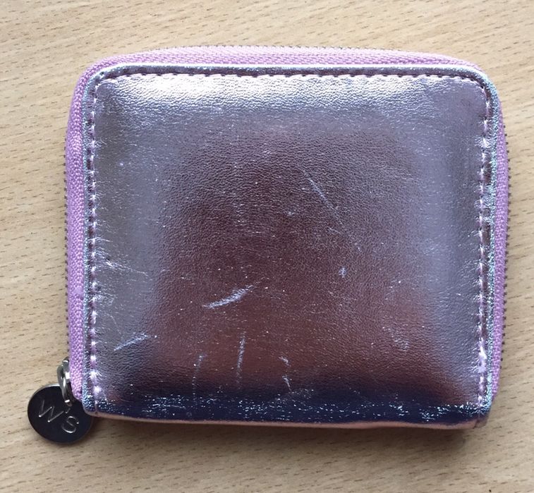 Porta-moedas e notas stradivarius