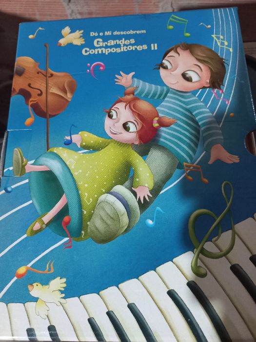 Livros sobre música com CDs.