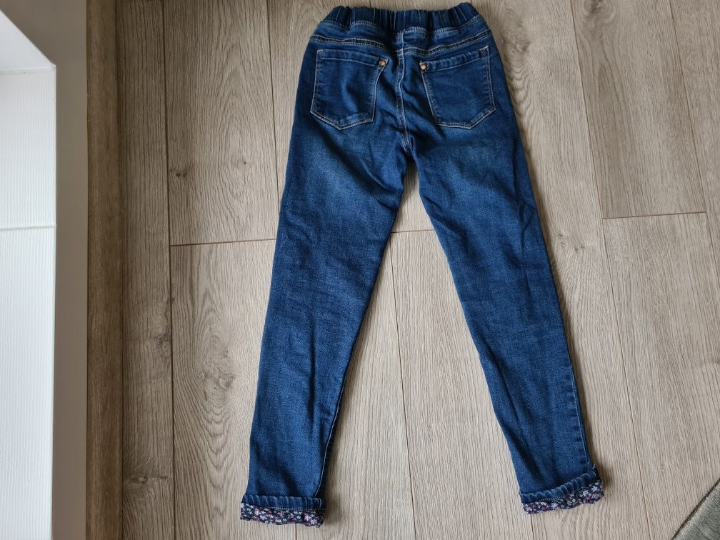 Dziewczęce spodnie jeansy ocieplane z podszewką Pepco rozmiarze 134