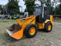 Фронтальний навантажувач JCB 409
