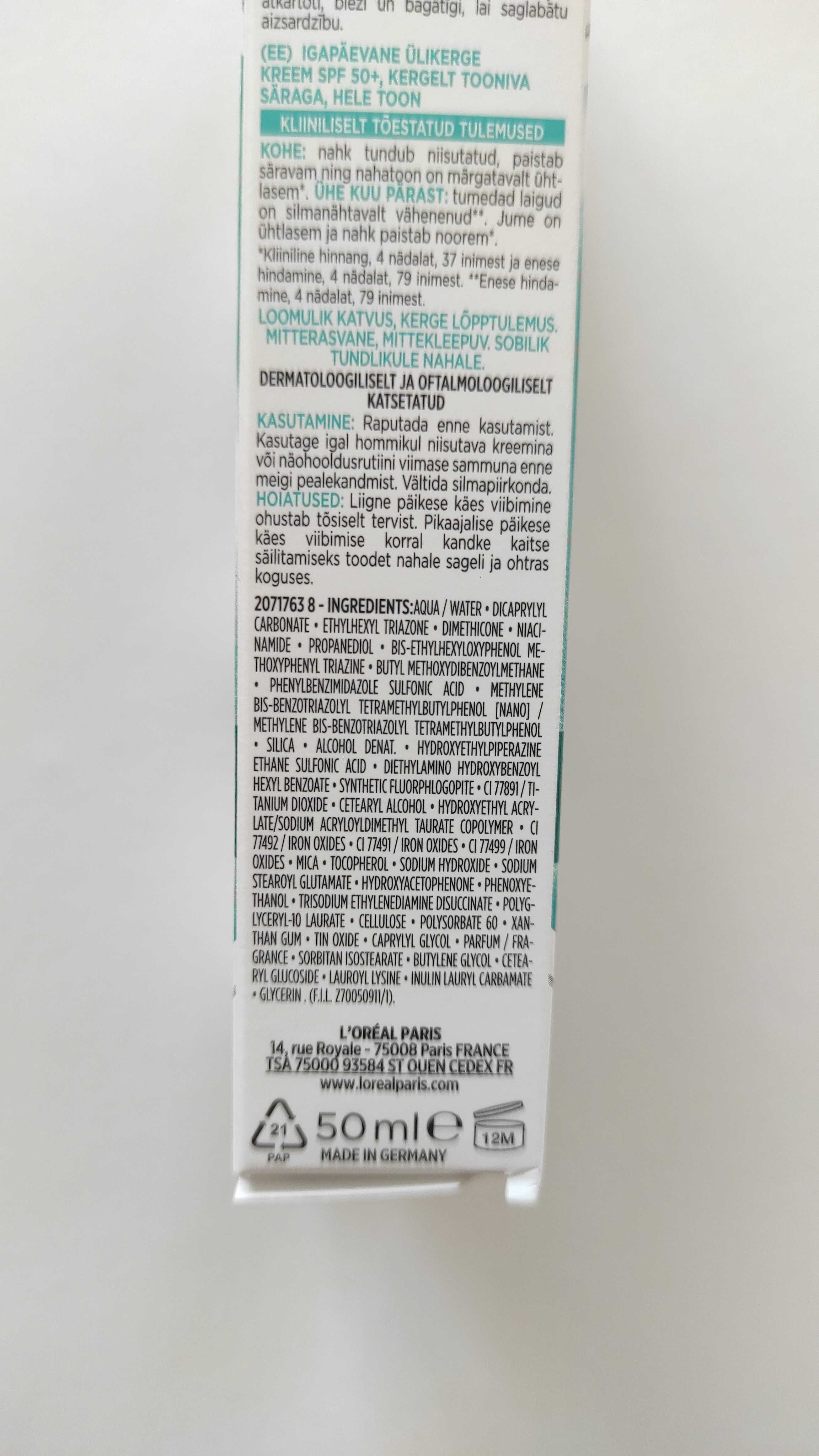 Rozświetlający fluid Loreal Bright Reveal Daily Fluid Tined Glow SPF50