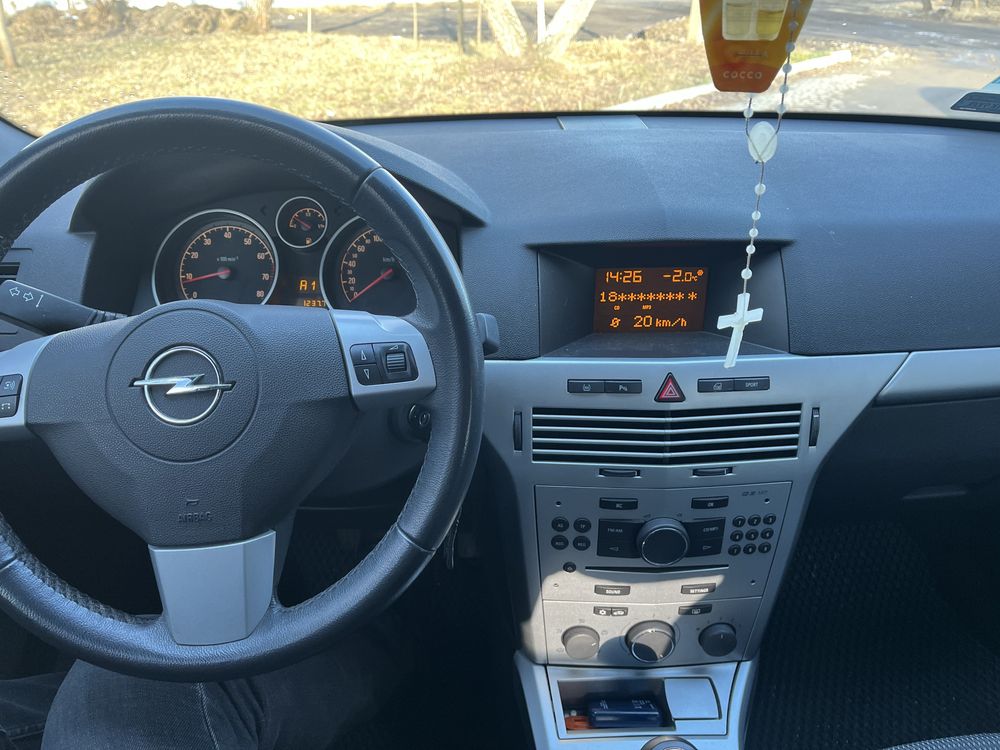 Opel Astra,2009,1,6,АКП