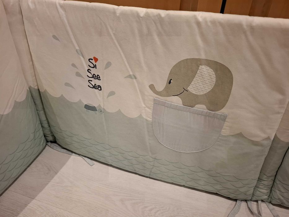 Resguardo de cama de bebé. Como novo. Dentro do saco original