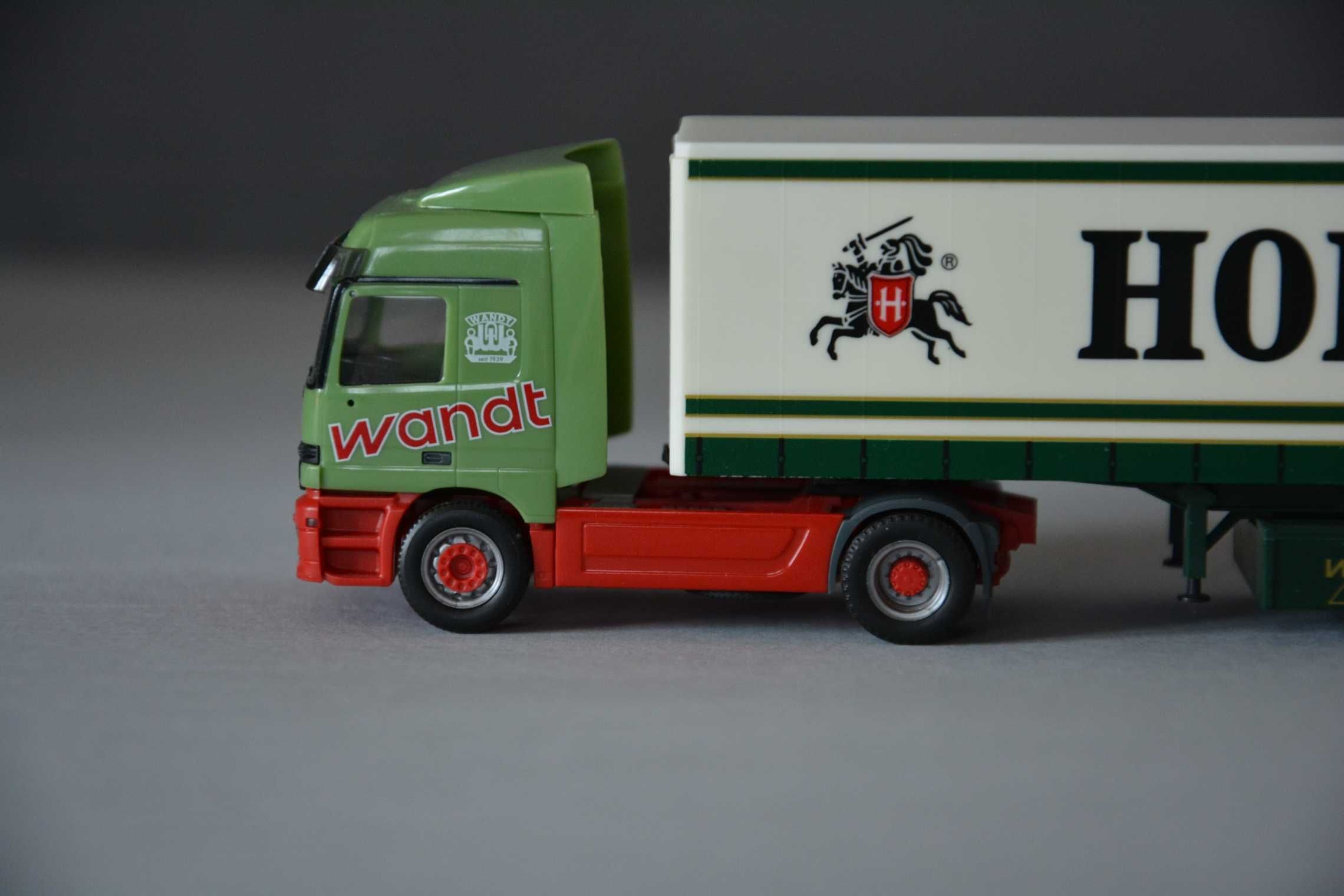 1:87 (H0) Herpa (146708) - MB Actros L + kurtyna - Wandt/Holsten