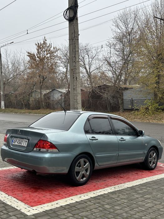 Продам лансер 9 автомат газ/бензин рестайлинг