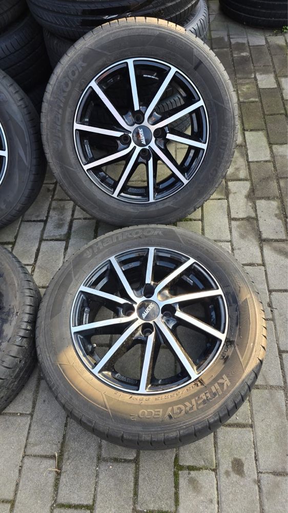 Felgi 15” 4x100 ET39 + opony 185/65R15 Firestone/Hankook