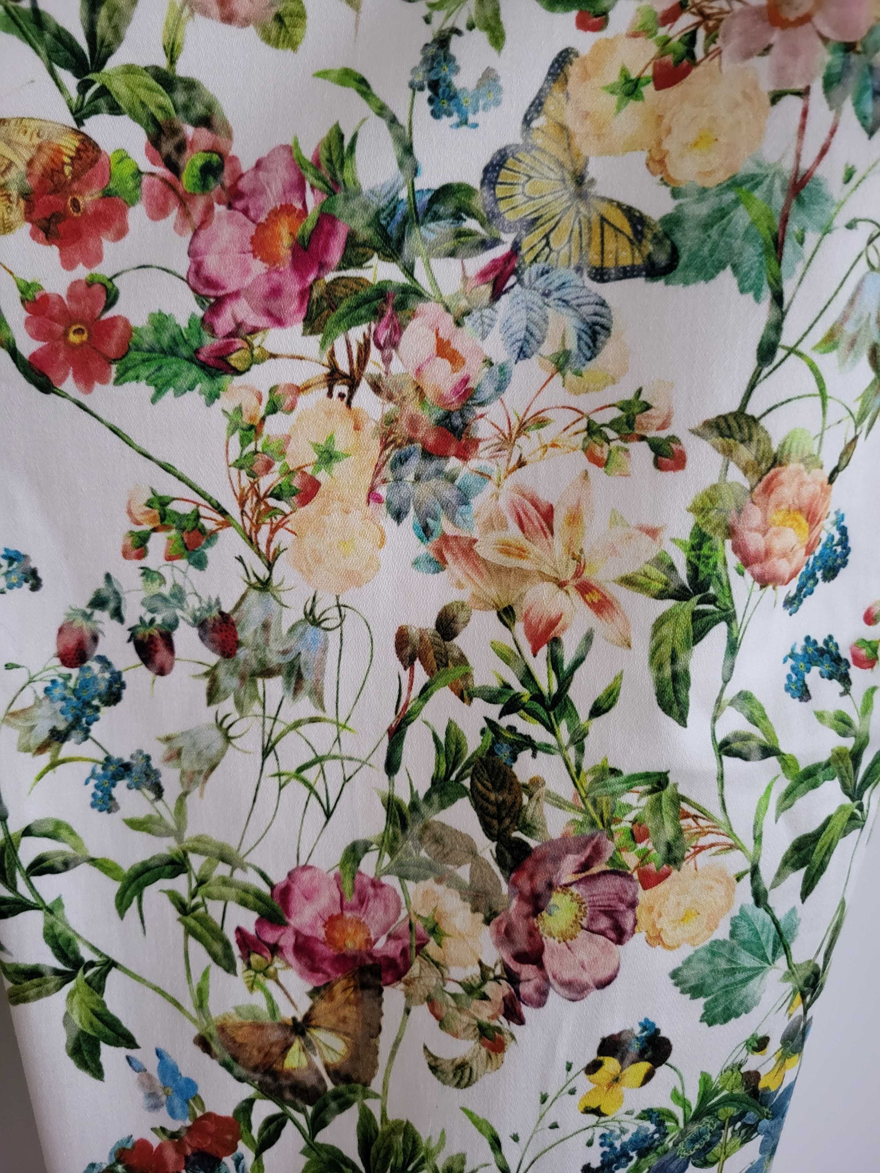 Spodnie kolorowe, kwiaty, motyw roślinny, rozmiar 38