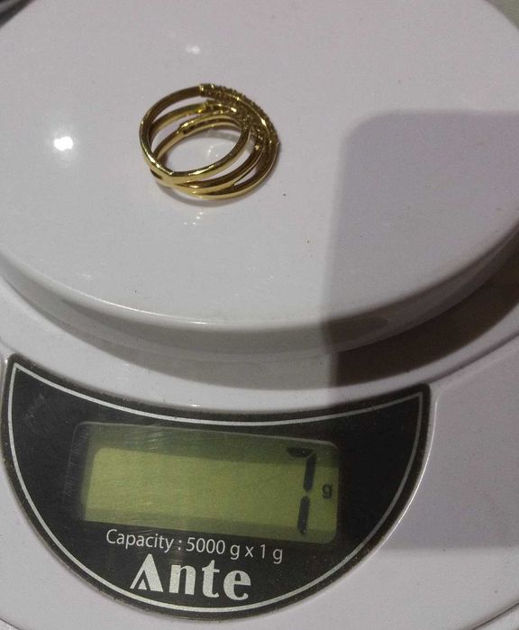 Anel triplo em ouro com brilhantes