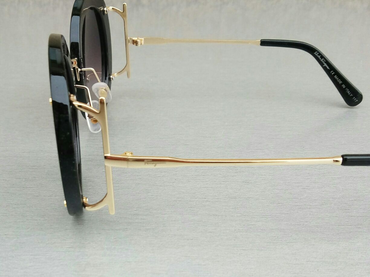 Salvatore Ferragamo очки женские солнцезащитные круглые черные с золот