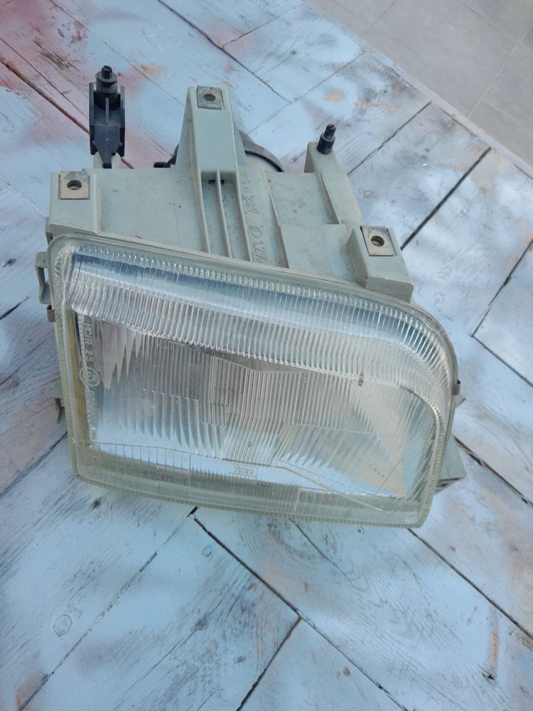 Farol renault clio