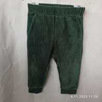 Zielone spodnie dziecięce H&M rozm. 74