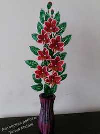 Орхидея в вазе красная с розовым