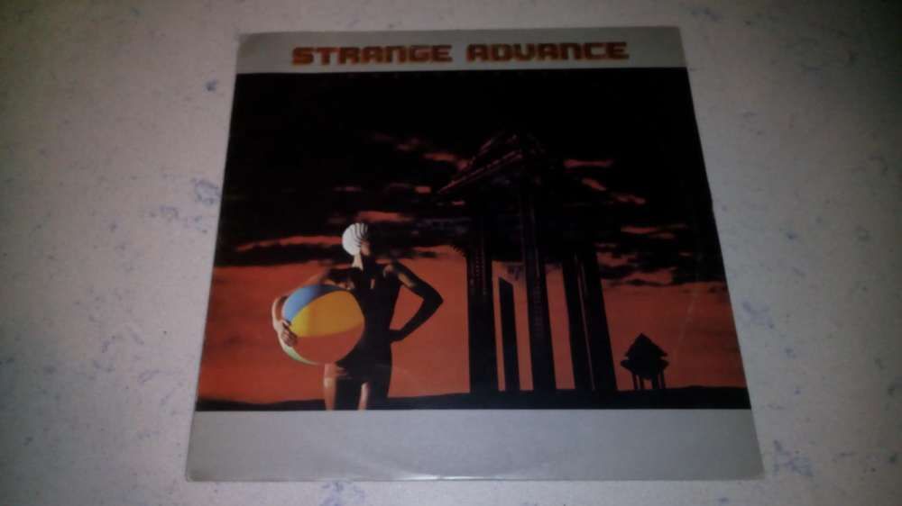 Strange Advance - worlds away LP 1982