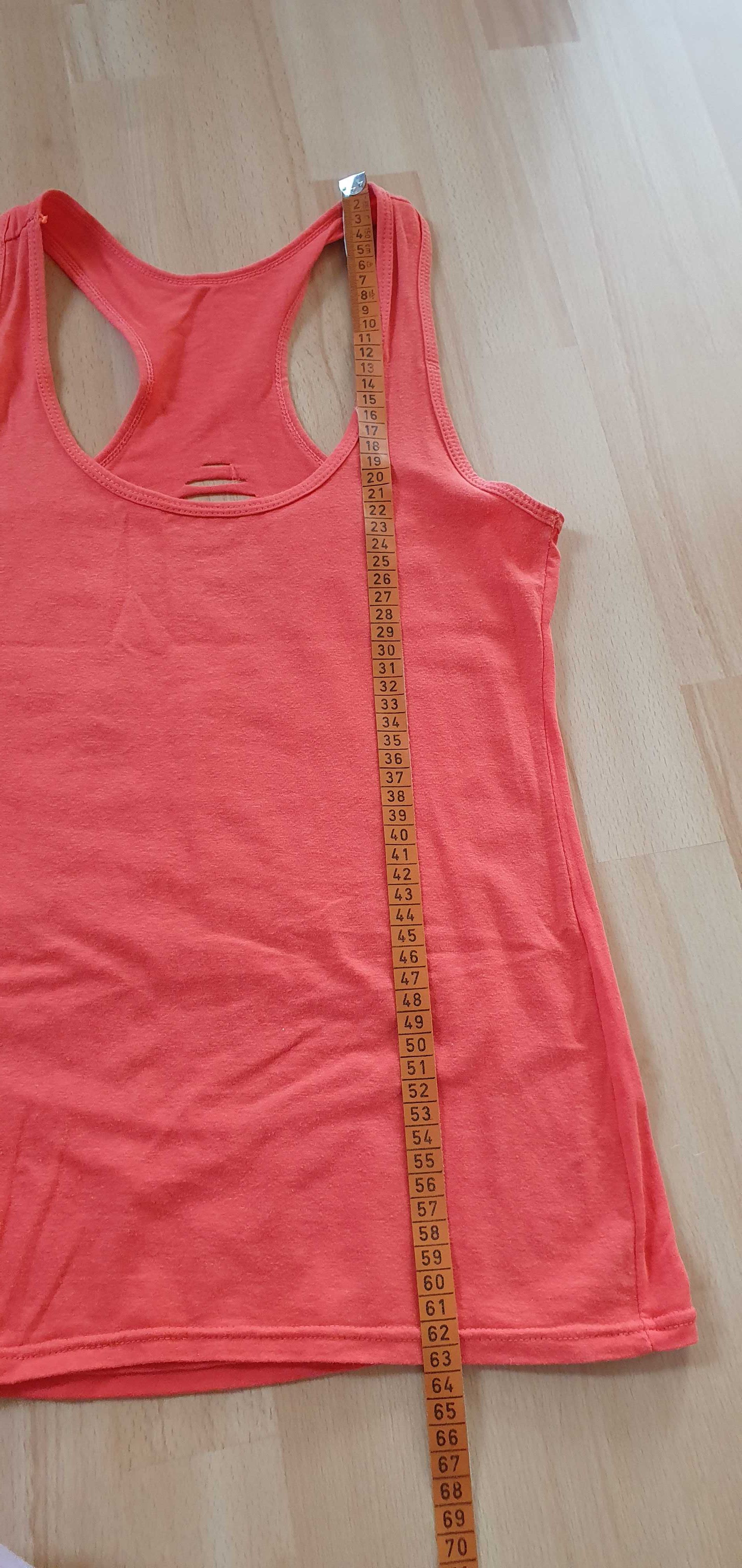Ciekawa bluzka bokserka z rozcięciami na plecach rozmiar M-L