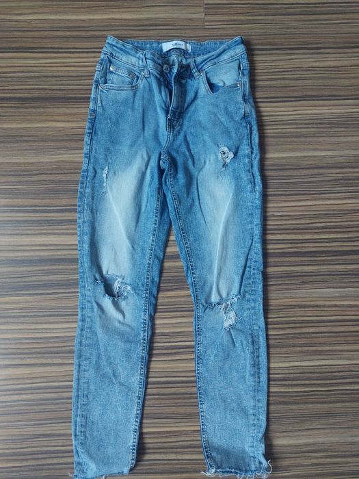 Spodnie jeansy z dziurami skinny 38 M