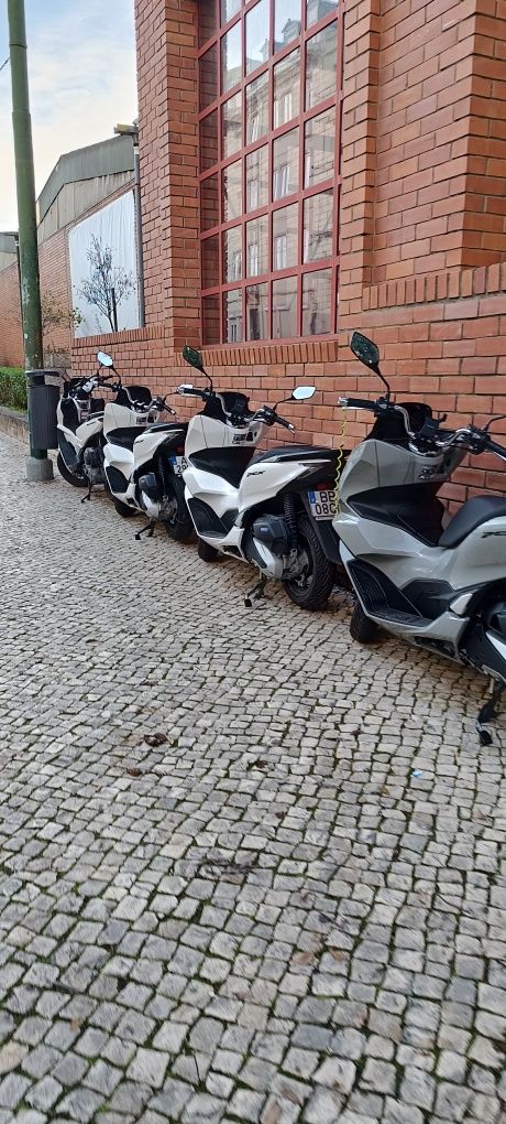 Aluguel de moto + Bolt, Uber e glovo