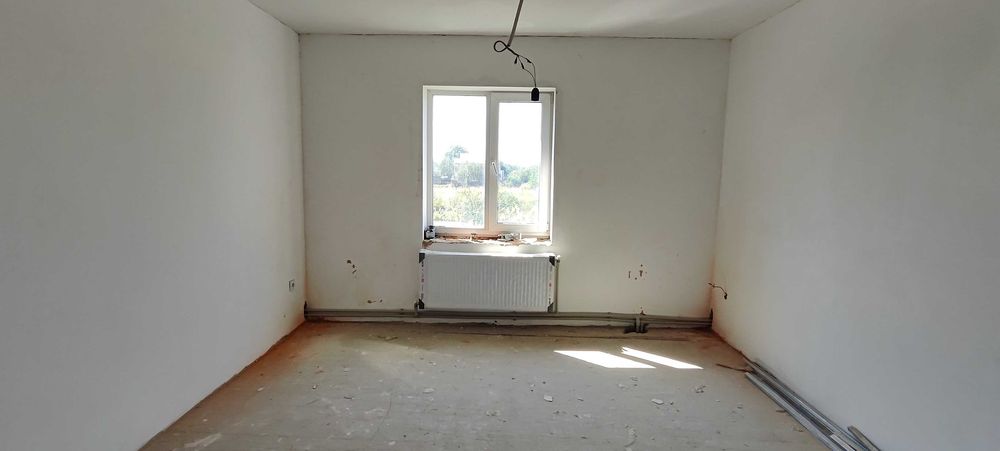 Продам нову половину будинку.Три роздільні кімнати.Два санвузли.Гараж