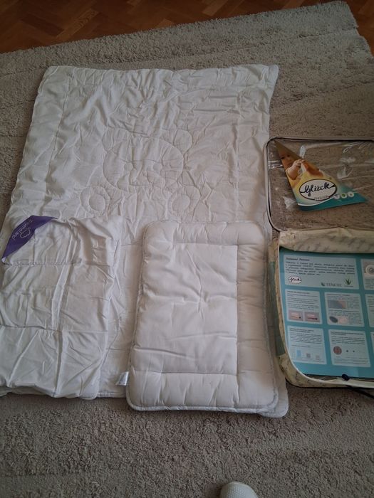 Kolderka i poduszeczka dla niemowlaka firmy Lenzing