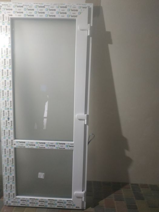 Металопластикові двері WDS