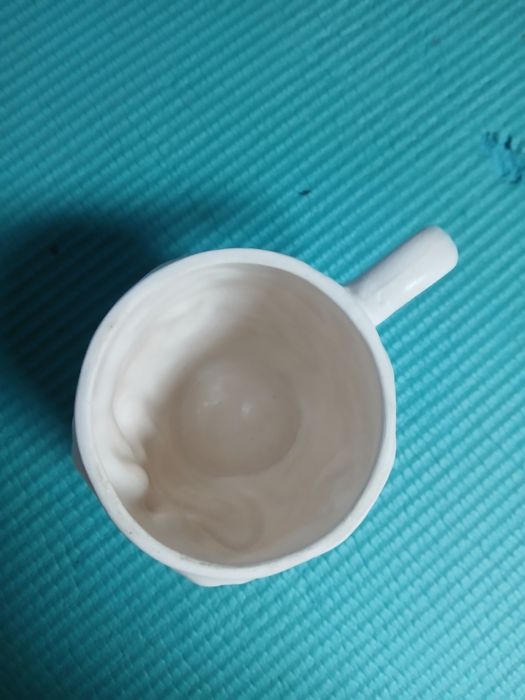 Kubek z motywem twarzy jokera