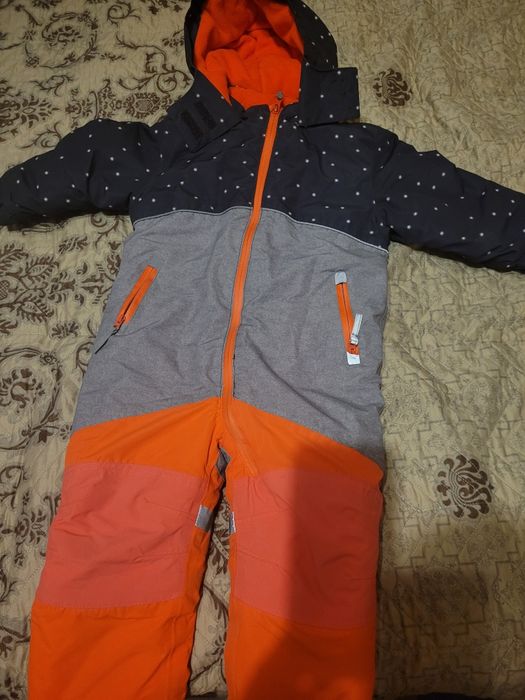 Продам зимний комбинезон Тополино размер 92