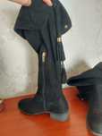 Botas pretas cano médio