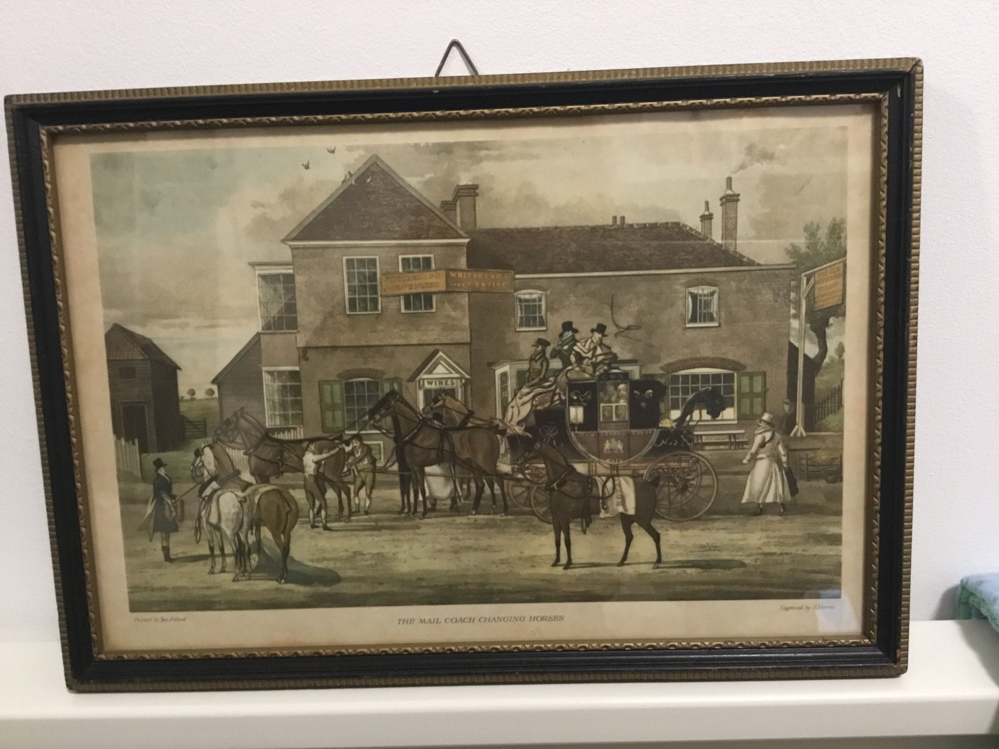 Quadro vintage em moldura de madeira.