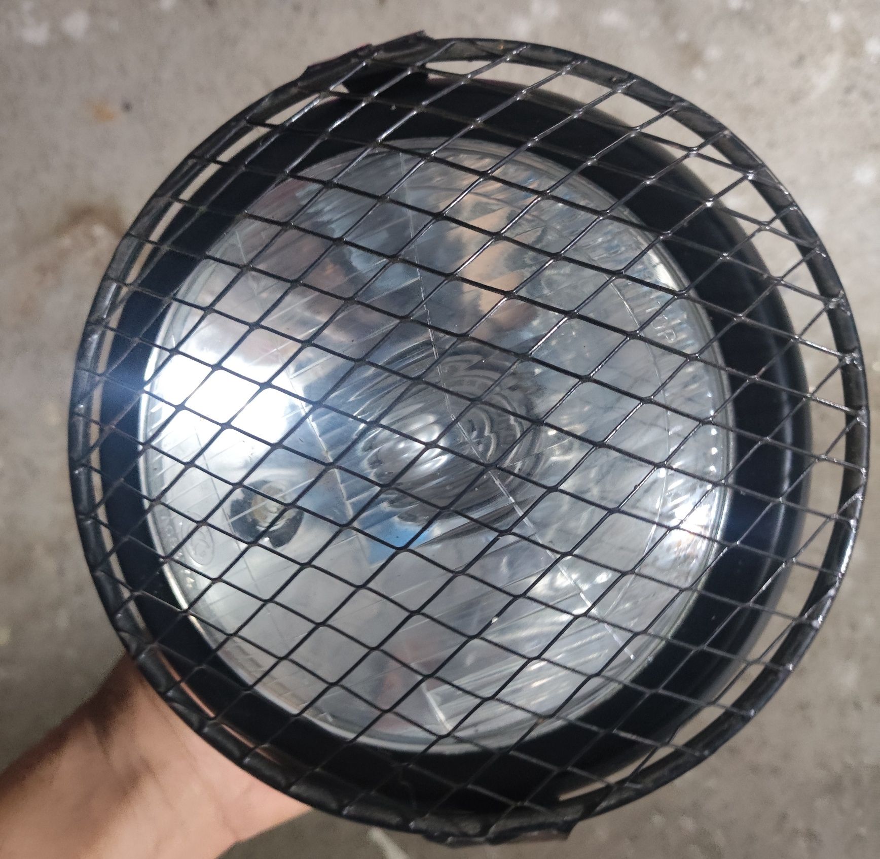 Farol grelha proteção