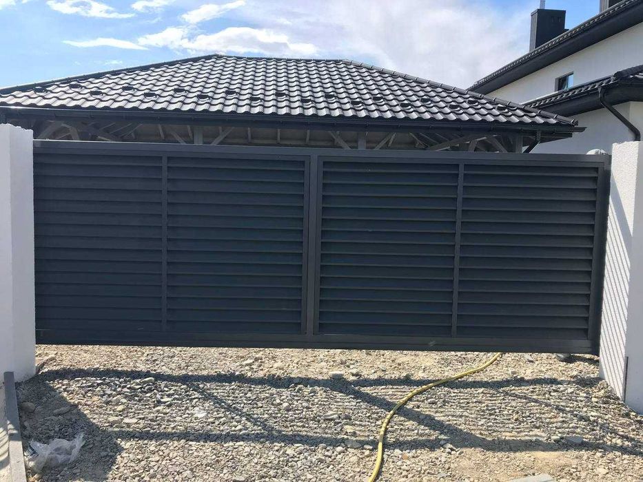 ВІДКАТНІ ВОРОТА з металу — швидкий монтаж, вигідна ціна