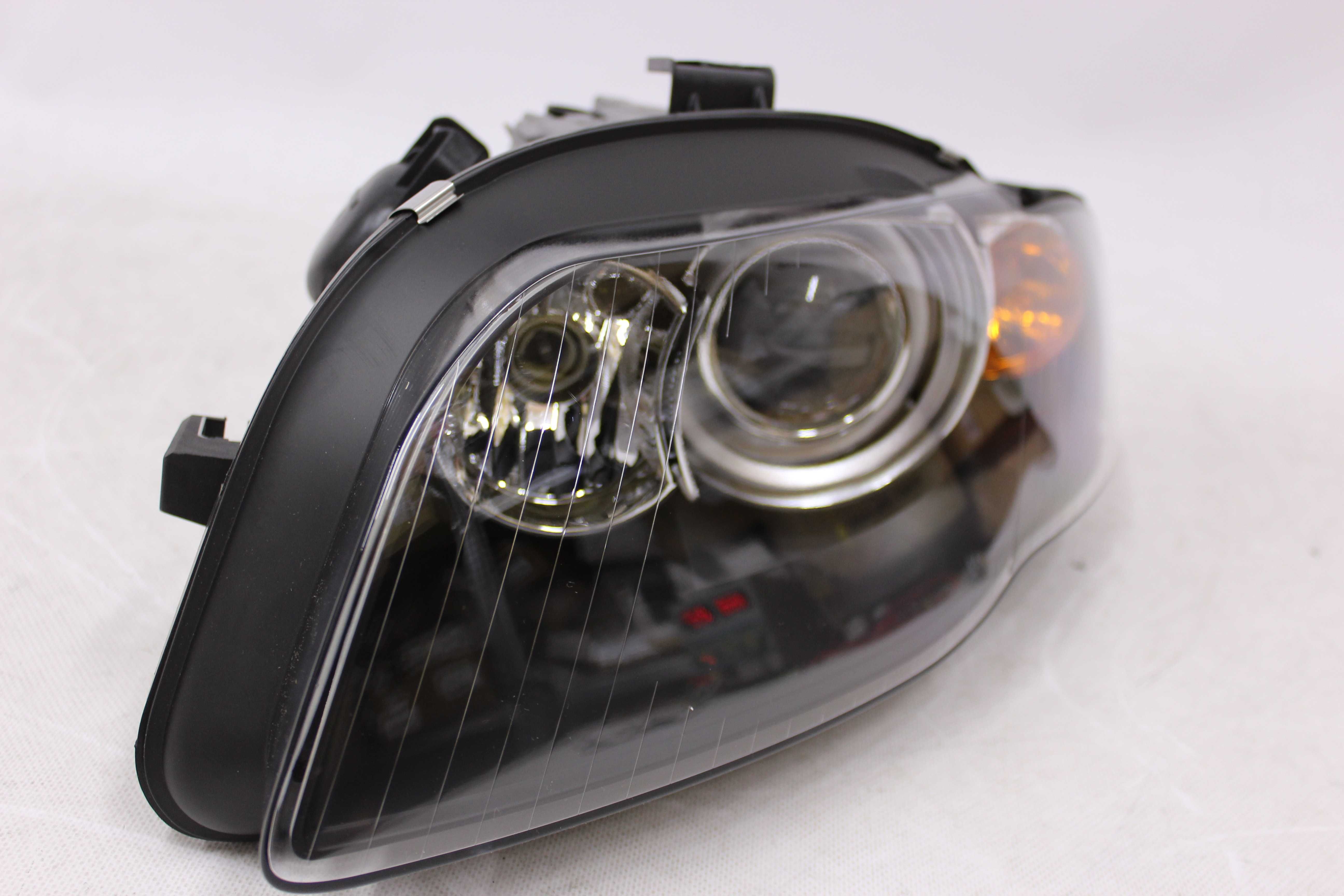 Reflektor Lampa lewa przód przednia AUDI A4 B7 04-08 D1S XENON NOWA